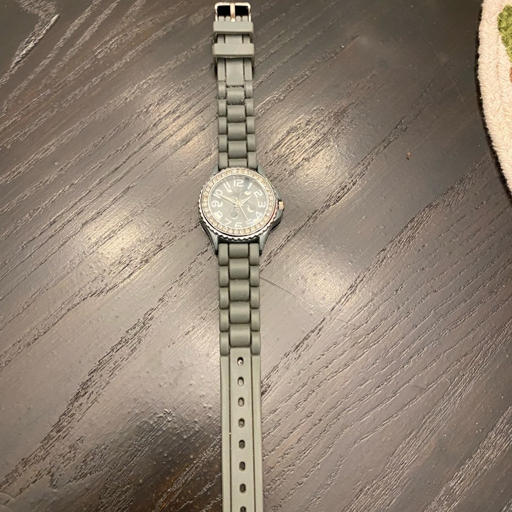Grey Geneva watch, stainless steel back, water resistant, silicone band